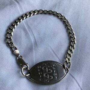 Silver Bags with Chunky Chain Design and Oval Centerpiece